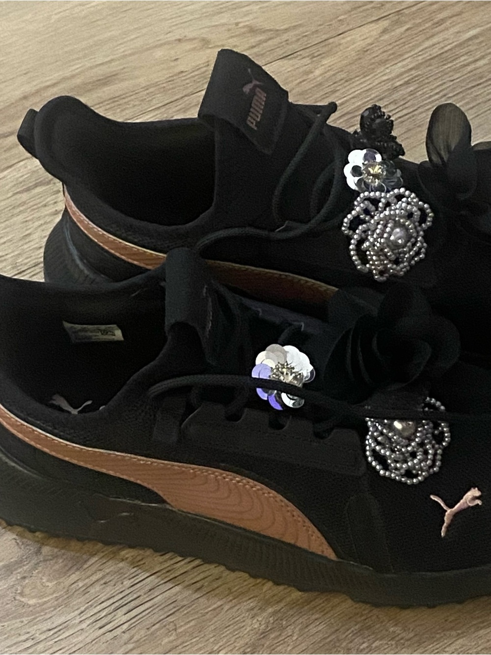 Puma Women’s Black Sneakers with Rose Gold Accent